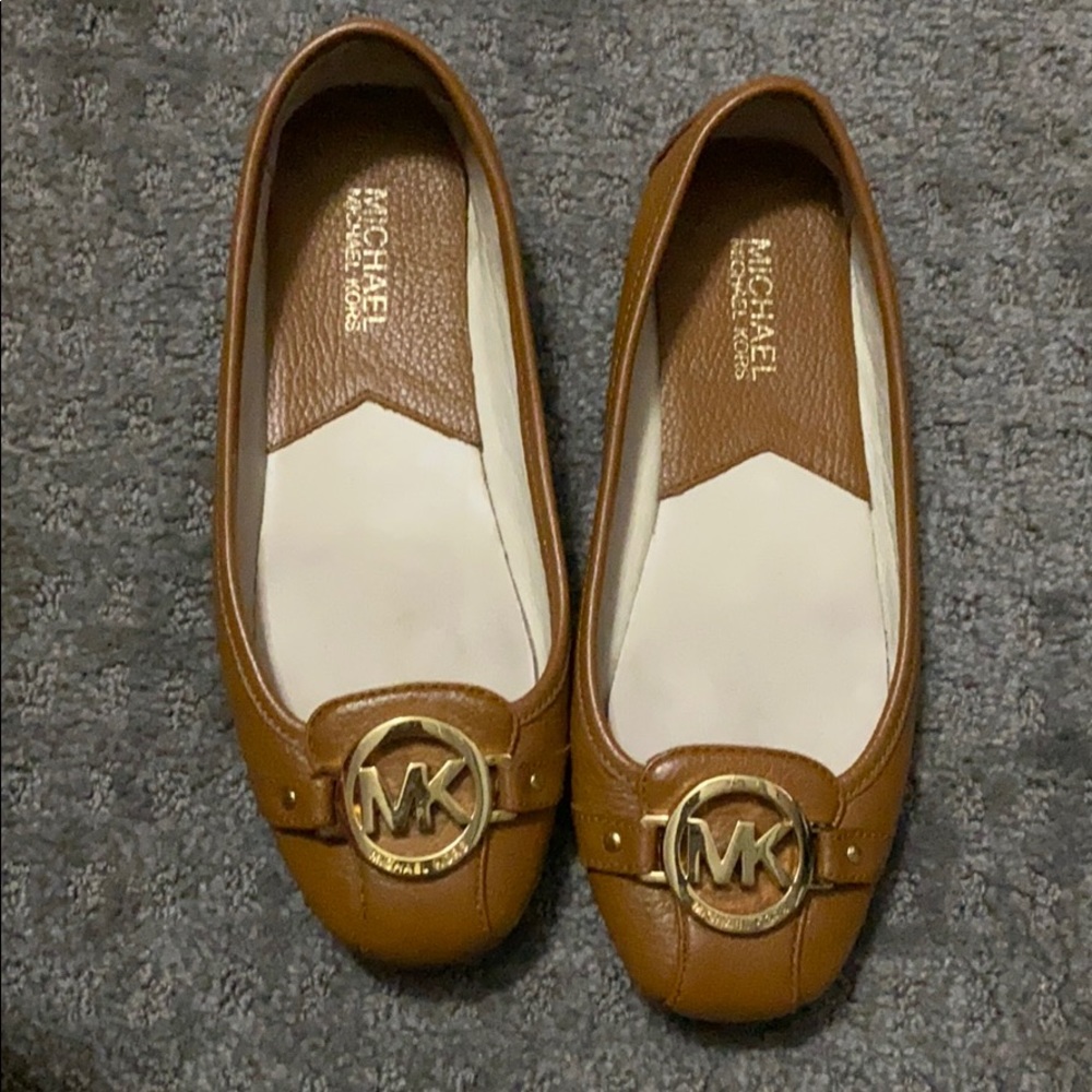 Brown leather flats